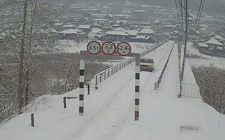 Мост через проток реки Кута в Усть-Куте